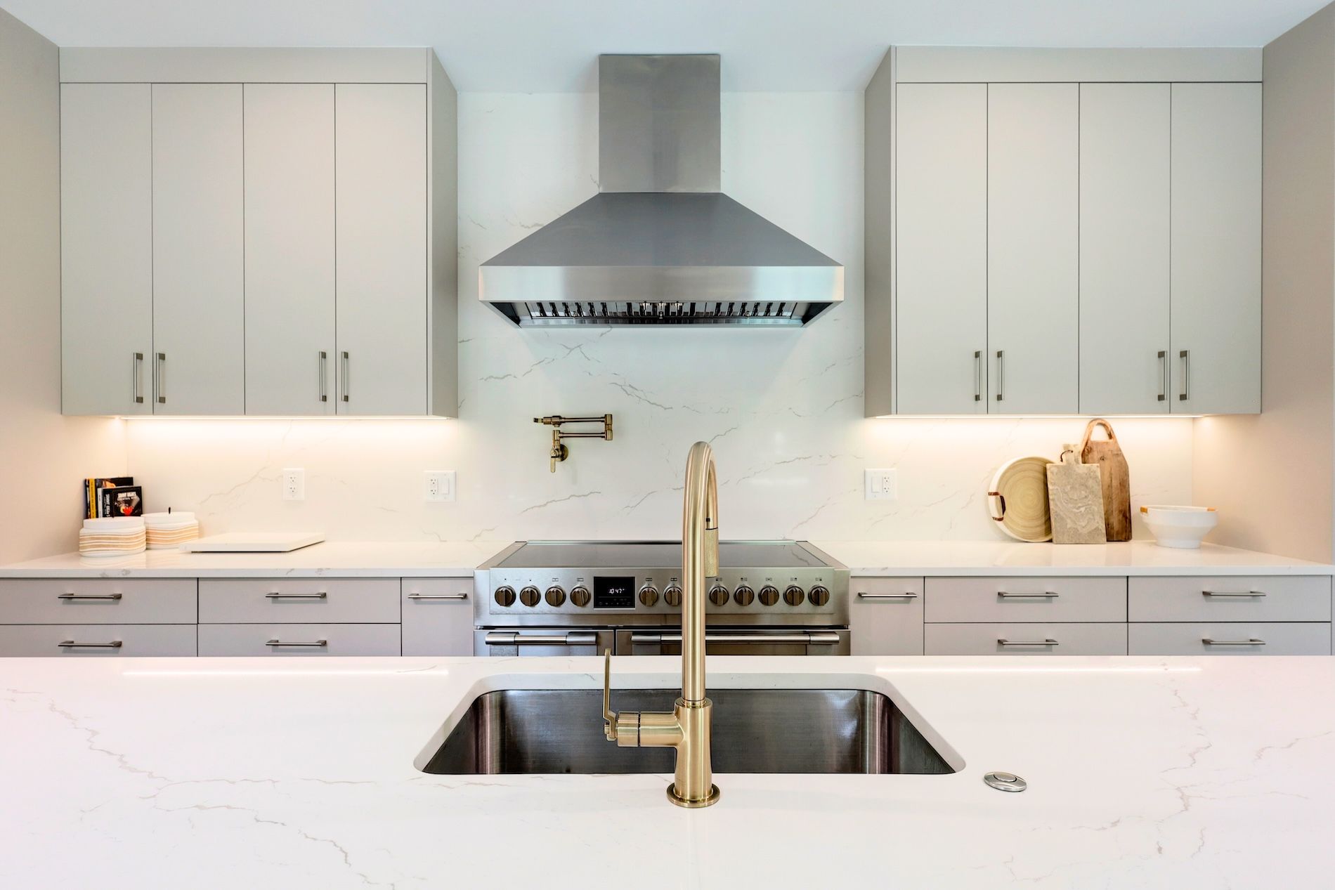 Custom kitchen with quartz countertops and integrated cabinetry